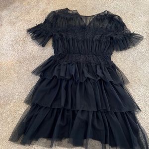 Black lace/ruffle dress.